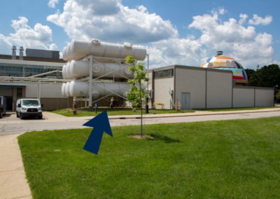 The back of GFL and an arrow pointing toward the back door.