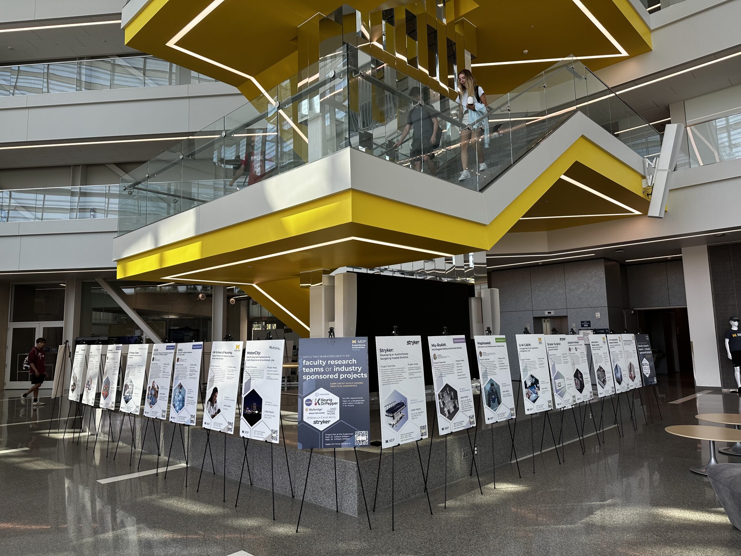 A row of MDP Project Fair posters in the Chemistry Building.